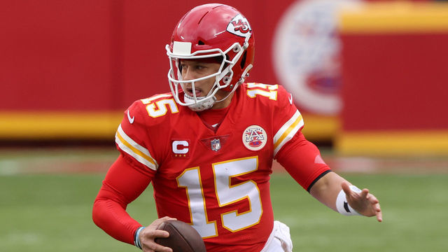 KANSAS CITY, MISSOURI - JANUARY 17: Quarterback Patrick Mahomes #15 of the Kansas City Chiefs scrambles against the defense of the Cleveland Browns during the secondquarter of the AFC Divisional Playoff game at Arrowhead Stadium on January 17, 2021 in Kansas City, Missouri.