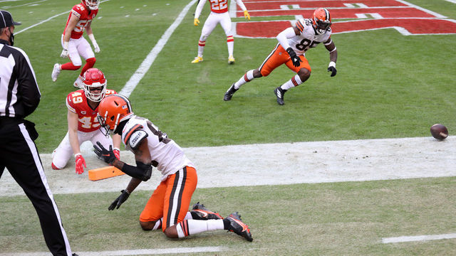 KANSAS CITY, MISSOURI - JANUARY 17: Wide receiver Rashard Higgins #82 of the Cleveland Browns fumbles the football out of bonds in the end zone for a touchback after hit from free safety Daniel Sorensen #49 of the Kansas City Chiefs during the second quarter of the AFC Divisional Playoff game at Arrowhead Stadium on January 17, 2021 in Kansas City, Missouri.