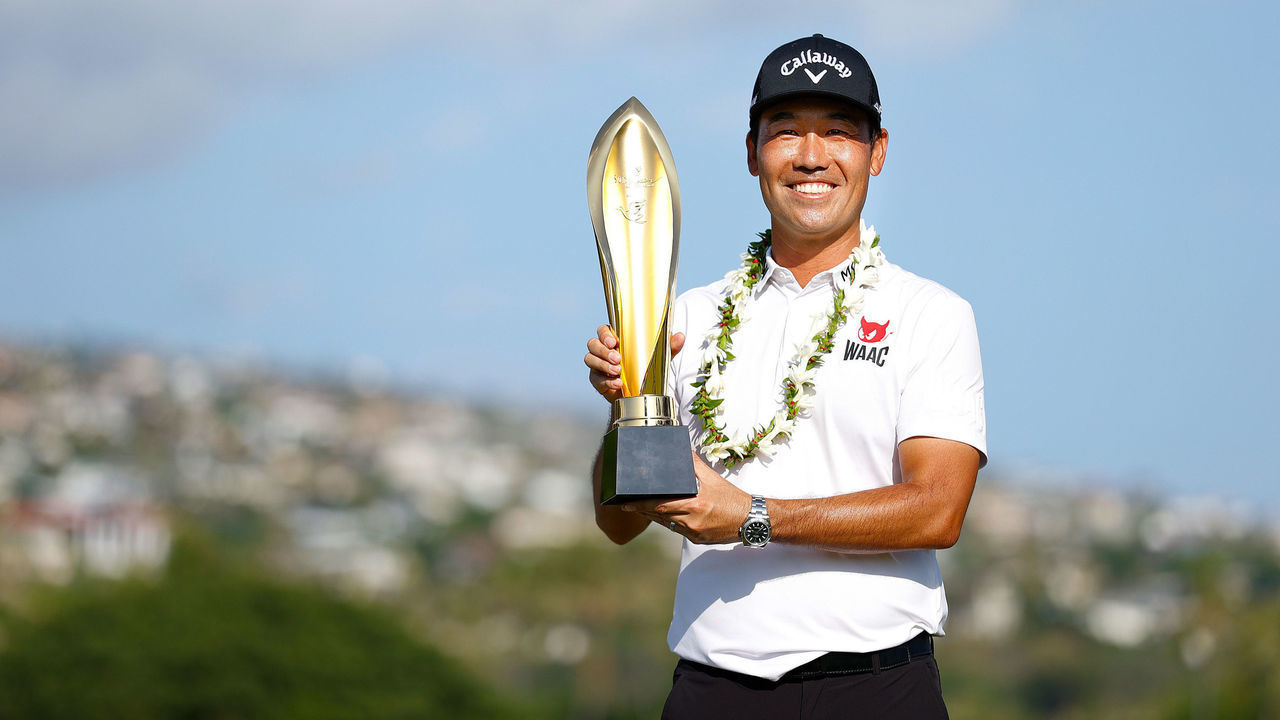 HONOLULU, HAWAII - JANUARY 17: Kevin Na of the United States celebrates with the trophy after winning the Sony Open in Hawaii at the Waialae Country Club on January 17, 2021 in Honolulu, Hawaii.