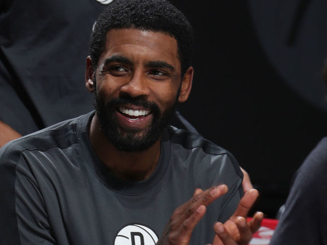BROOKLYN, NY - JANUARY 5: Kyrie Irving #11 of the Brooklyn Nets smiles during the game against the Utah Jazz on January 5, 2021 at Barclays Center in Brooklyn, New York. Mandatory Copyright Notice: Copyright 2021 NBAE
