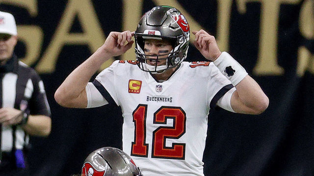 NEW ORLEANS, LOUISIANA - JANUARY 17: Tom Brady #12 of the Tampa Bay Buccaneers calls a play against the New Orleans Saints during the second quarter in the NFC Divisional Playoff game at Mercedes Benz Superdome on January 17, 2021 in New Orleans, Louisiana.