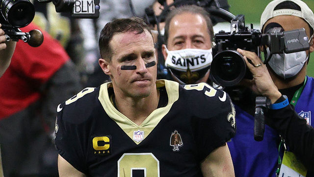 NEW ORLEANS, LOUISIANA - JANUARY 17: Drew Brees #9 of the New Orleans Saints walks off the field after being defeated by the Tampa Bay Buccaneers in the NFC Divisional Playoff game at Mercedes Benz Superdome on January 17, 2021 in New Orleans, Louisiana.