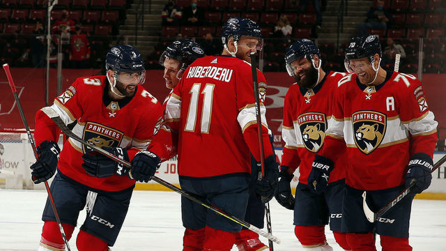 SUNRISE, FL - JANUARY 17: Keith Yandle #3 of the Florida Panthers celebrates his goal with teammates during the second period against the Chicago Blackhawks at the BB&T Center on January17, 2021 in Sunrise, Florida.