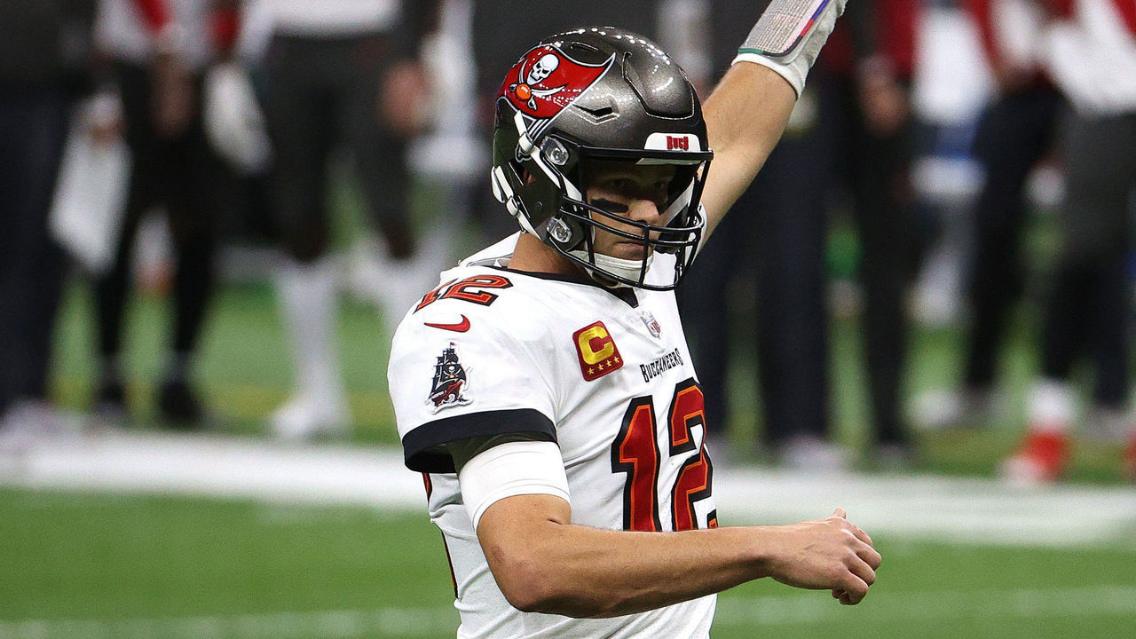 NEW ORLEANS, LOUISIANA - JANUARY 17: Tom Brady #12 of the Tampa Bay Buccaneers points to the air against the New Orleans Saints during the fourth quarter in the NFC Divisional Playoff game at Mercedes Benz Superdome on January 17, 2021 in New Orleans, Louisiana.