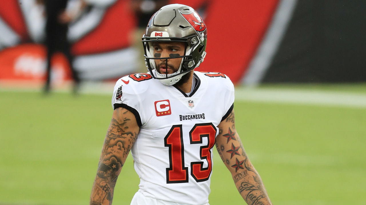TAMPA, FLORIDA - SEPTEMBER 20: Mike Evans #13 of the Tampa Bay Buccaneers warms up before the game against the Carolina Panthers at Raymond James Stadium on September 20, 2020 in Tampa, Florida.