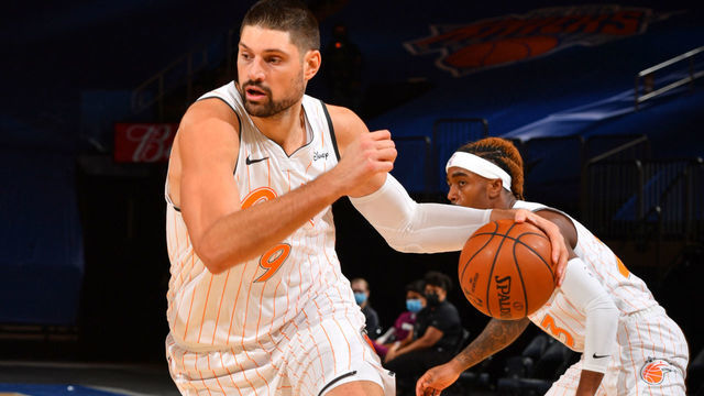 PHILADELPHIA, PA - JANUARY 18: Nikola Vucevic #9 of the Orlando Magic drives to the basket against the New York Knicks on January 18, 2021 at Madison Square Garden in New York City, New York. NOTE TO USER: User expressly acknowledges and agrees that, by downloading and/or using this Photograph, user is consenting to the terms and conditions of the Getty Images License Agreement. Mandatory Copyright Notice: Copyright 2021 NBAE