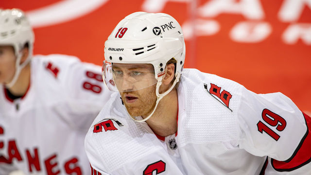 DETROIT, MI - JANUARY 14: Dougie Hamilton #19 of the Carolina Hurricanes lines up for a face-off during an NHL game against the Detroit Red Wings at Little Caesars Arena on January 14, 2021 in Detroit, Michigan.