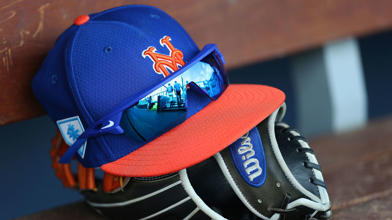 WEST PALM BEACH, FL - MARCH 11: The New Era cap, Nike sunglasses and Wilson glove of Michael Conforto #30 of the New York Mets during a spring training baseball game against the Houston Astros at Fitteam Ballpark of the Palm Beaches on March 11, 2019 in West Palm Beach, Florida. The Astros defeated the Mets 6-3.