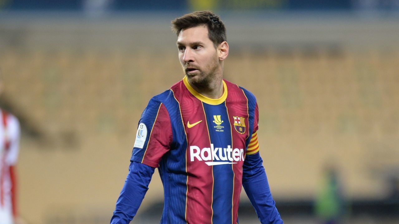 Barcelona's Argentinian forward Lionel Messi walks on the pitch during the Spanish Super Cup final football match between FC Barcelona and Athletic Club Bilbao at La Cartuja stadium in Seville on January 17, 2021.
