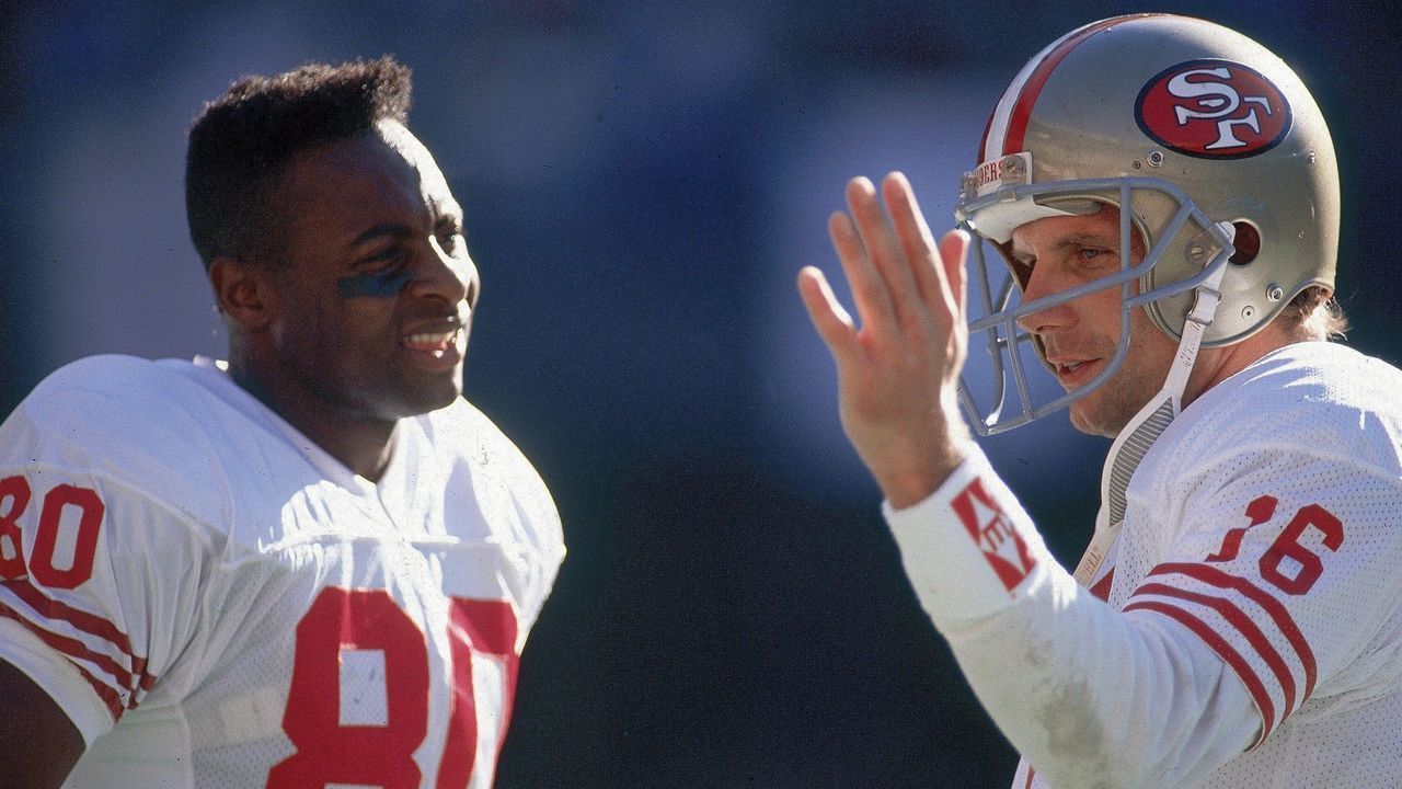 UNITED STATES - DECEMBER 09: Football: Closeup of San Francisco 49ers Jerry Rice (80) and QB Joe Montana (16) on sidelines during game vs Cincinnati Bengals, Cincinnati, OH 12/9/1990