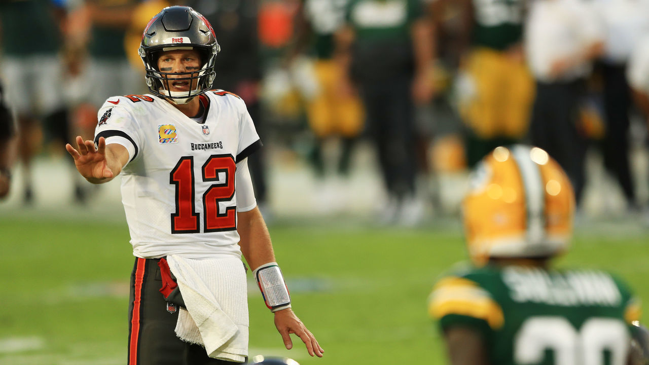 TAMPA, FLORIDA - OCTOBER 18: Tom Brady #12 of the Tampa Bay Buccaneers calls a play against the Green Bay Packers during the third quarter at Raymond James Stadium on October 18, 2020 in Tampa, Florida.
