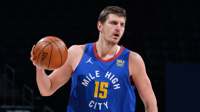 DENVER, CO - JANUARY 14: Nikola Jokic #15 of the Denver Nuggets dribbles the ball on January 14, 2021 at the Ball Arena in Denver, Colorado. NOTE TO USER: User expressly acknowledges and agrees that, by downloading and/or using this Photograph, user is consenting to the terms and conditions of the Getty Images License Agreement. Mandatory Copyright Notice: Copyright 2021 NBAE