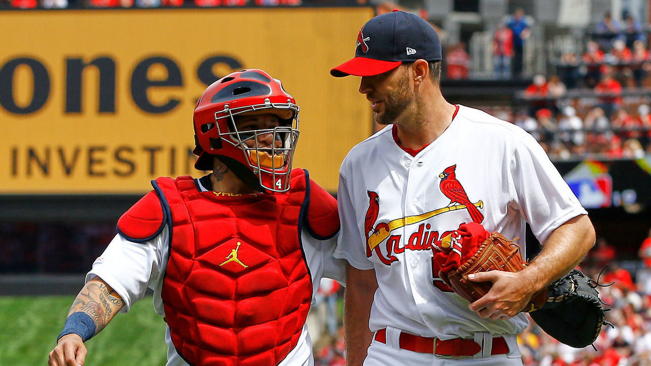 ST. LOUIS, MO - MAY 10: Adam Wainwright #50 and Yadier Molina #4 of the St. Louis Cardinals walk from the bullpen prior to the start of a game against the San Diego Padres on April 7, 2019 at Busch Stadium in St. Louis, Missouri.