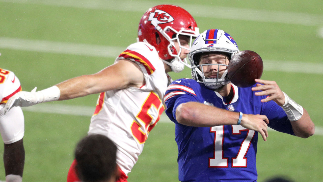 ORCHARD PARK, NEW YORK - OCTOBER 19: Josh Allen #17 of the Buffalo Bills has the ball knocked loose by Ben Niemann #56 of the Kansas City Chiefs during the second half at Bills Stadium on October 19, 2020 in Orchard Park, New York.