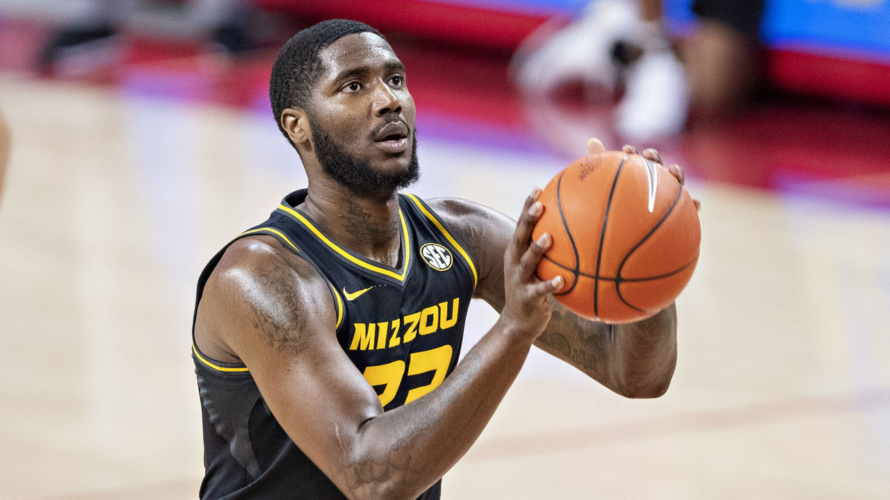 FAYETTEVILLE, ARKANSAS - JANUARY 02: Jeremiah Tilmon #23 of the Missouri Tigers shoots a free throw during a game against the Arkansas Razorbacks at Bud Walton Arena on January 02, 2021 in Fayetteville, Arkansas. The Tigers defeated the Razorbacks 81-68.