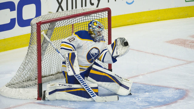PHILADELPHIA, PA - JANUARY 18: Buffalo Sabres goaltender Carter Hutton (40) makes a glove save during the game between the Buffalo Sabres and the Philadelphia Flyers on January 18, 2021 at Wells Fargo Center in Philadelphia, PA. (
