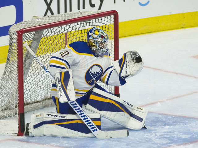 PHILADELPHIA, PA - JANUARY 18: Buffalo Sabres goaltender Carter Hutton (40) makes a glove save during the game between the Buffalo Sabres and the Philadelphia Flyers on January 18, 2021 at Wells Fargo Center in Philadelphia, PA. (