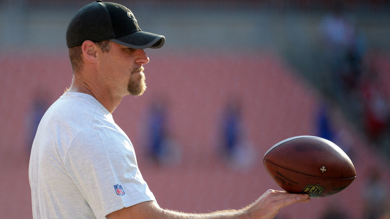 CLEVELAND, OH - AUGUST 10, 2017: Assistant head coach/tight ends Dan Campbell of the New Orleans Saints plays with a football as he stands on the sideline prior to a preseason game on August 10, 2017 against the Cleveland Browns at FirstEnergy Stadium in Cleveland, Ohio. Cleveland won 20-14. (Photo by: 2017 Nick Cammett/Diamond Images/Getty Images)