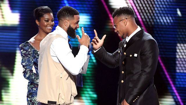 LOS ANGELES, CALIFORNIA - JULY 10: (L-R) Gabrielle Union and Odell Beckham Jr. present the Best Breakthrough Athlete award to Saquon Barkley onstage during The 2019 ESPYs at Microsoft Theater on July 10, 2019 in Los Angeles, California.