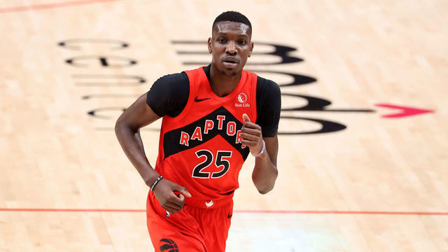 PORTLAND, OREGON - JANUARY 11: Chris Boucher #25 of the Toronto Raptors looks on in the first quarter against the Portland Trail Blazers at Moda Center on January 11, 2021 in Portland, Oregon.