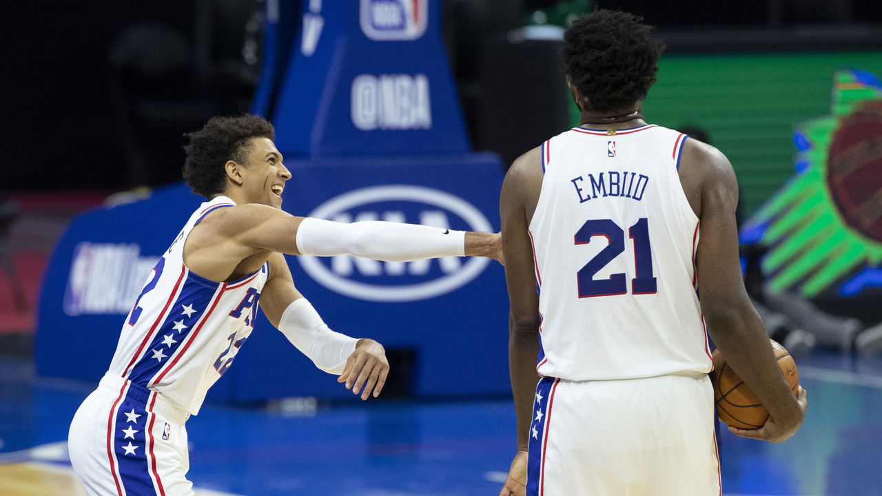 PHILADELPHIA, PA - JANUARY 20: Matisse Thybulle #22 and Joel Embiid #21 of the Philadelphia 76ers react in the final moments of the fourth quarter against the Boston Celtics at the Wells Fargo Center on January 20, 2021 in Philadelphia, Pennsylvania. The 76ers defeated the Celtics 117-109.