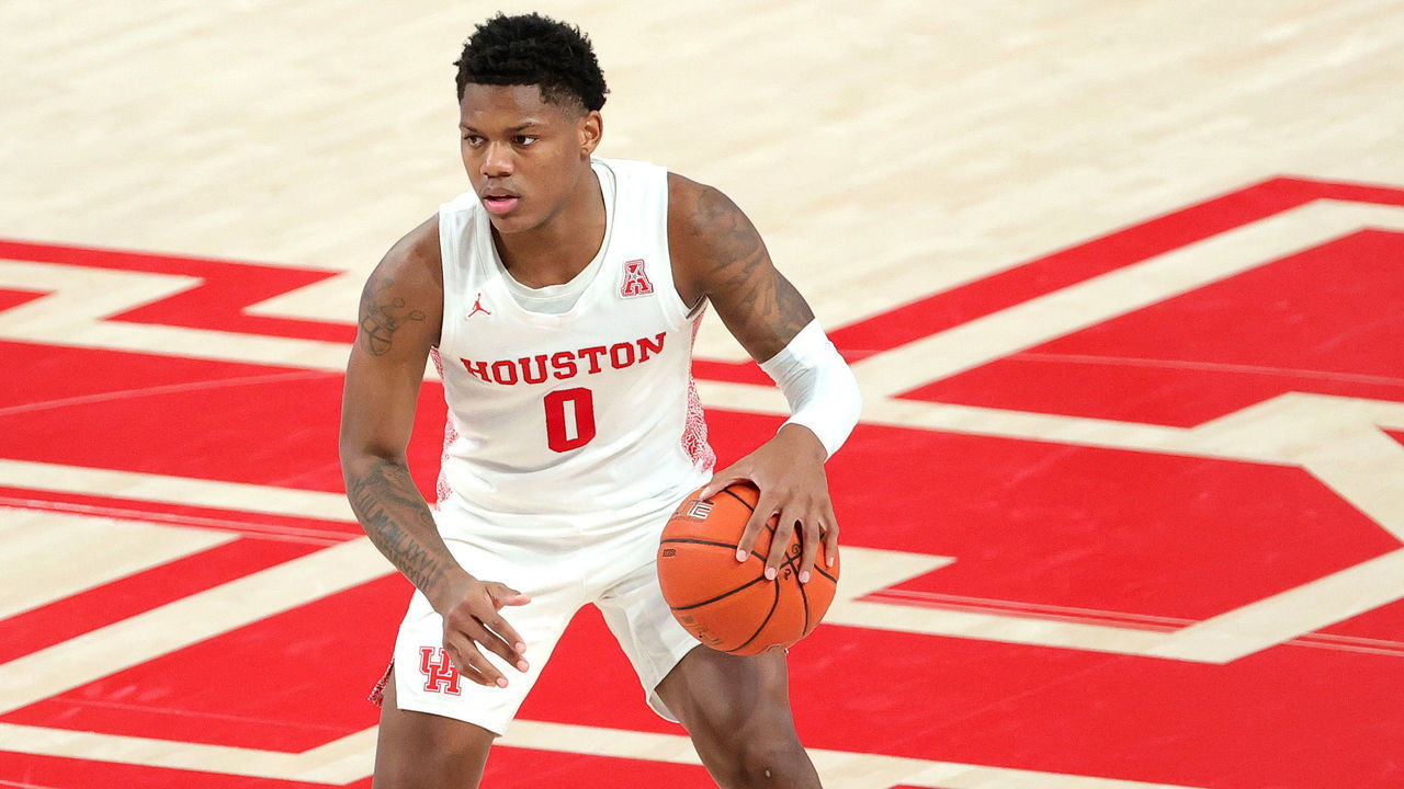 HOUSTON, TEXAS - JANUARY 17: Marcus Sasser #0 of the Houston Cougars in action against the UCF Knights during a game at Fertitta Center on January 17, 2021 in Houston, Texas.