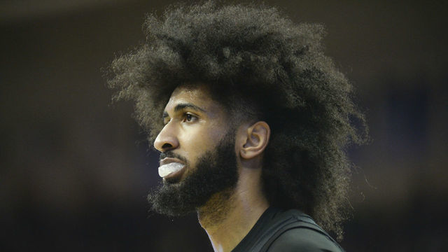 SEATTLE, WA - JANUARY 18: Washington Huskies guard Marcus Tsohonis (15) looks towards the UW bench during a PAC12 basketball game between the Oregon Ducks and the Washington Huskies on January 18, 2020, at Hec Ed Pavilion in Seattle, WA.