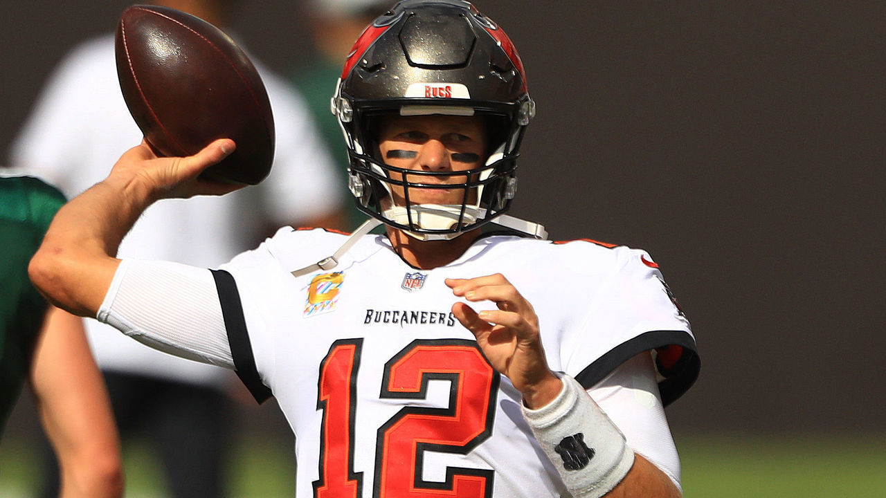 TAMPA, FLORIDA - OCTOBER 18: Tom Brady #12 of the Tampa Bay Buccaneers warms up against the Green Bay Packers at Raymond James Stadium on October 18, 2020 in Tampa, Florida.