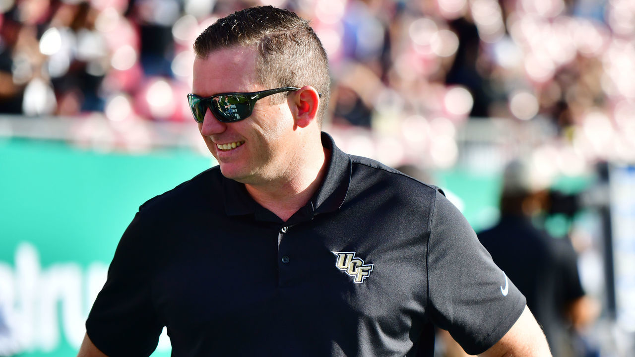 TAMPA, FLORIDA - NOVEMBER 23: The UCF Knights Athletic director Danny White stands on the sidelines during warm-up before a game against the South Florida Bulls at Raymond James Stadium on November 23, 2018 in Tampa, Florida.