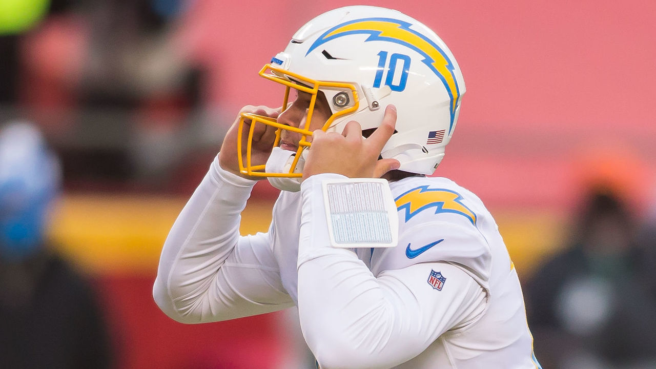 KANSAS CITY, MO - JANUARY 03: Los Angeles Chargers quarterback Justin Herbert (10) signals to his teammates at the line during the game between the Kansas City Chiefs and the Los Angeles Chargers on Sunday January 3, 2021 at Arrowhead Stadium in Kansas City, Missouri.