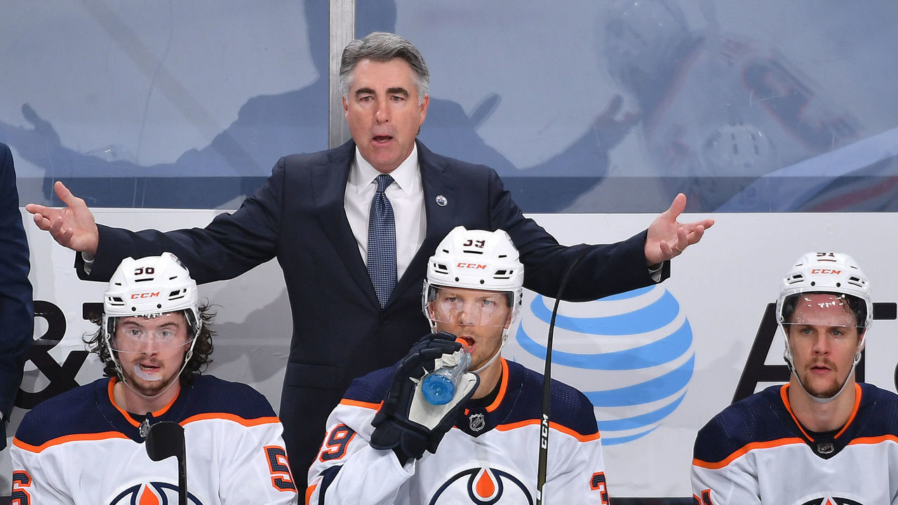 EDMONTON, ALBERTA - AUGUST 07: Head coach Dave Tippett of the Edmonton Oilers gestures to the on-ice official during the third period of Game Four of the Western Conference Qualification Round between the Edmonton Oilers and the Chicago Blackhawks at Rogers Place on August 07, 2020 in Edmonton, Alberta.