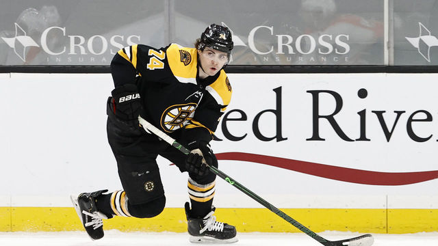 BOSTON, MA - JANUARY 21: Boston Bruins left wing Jake DeBrusk (74) looks to pass during a game between the Boston Bruins and the Philadelphia Flyers on January 21, 2021, at TD garden in Boston, Massachusetts.