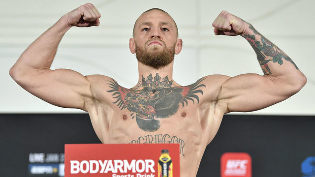 ABU DHABI, UNITED ARAB EMIRATES - JANUARY 22: Conor McGregor of Ireland poses on the scale during the UFC 257 weigh-in on UFC Fight Island on January 22, 2021 in Abu Dhabi, United Arab Emirates.