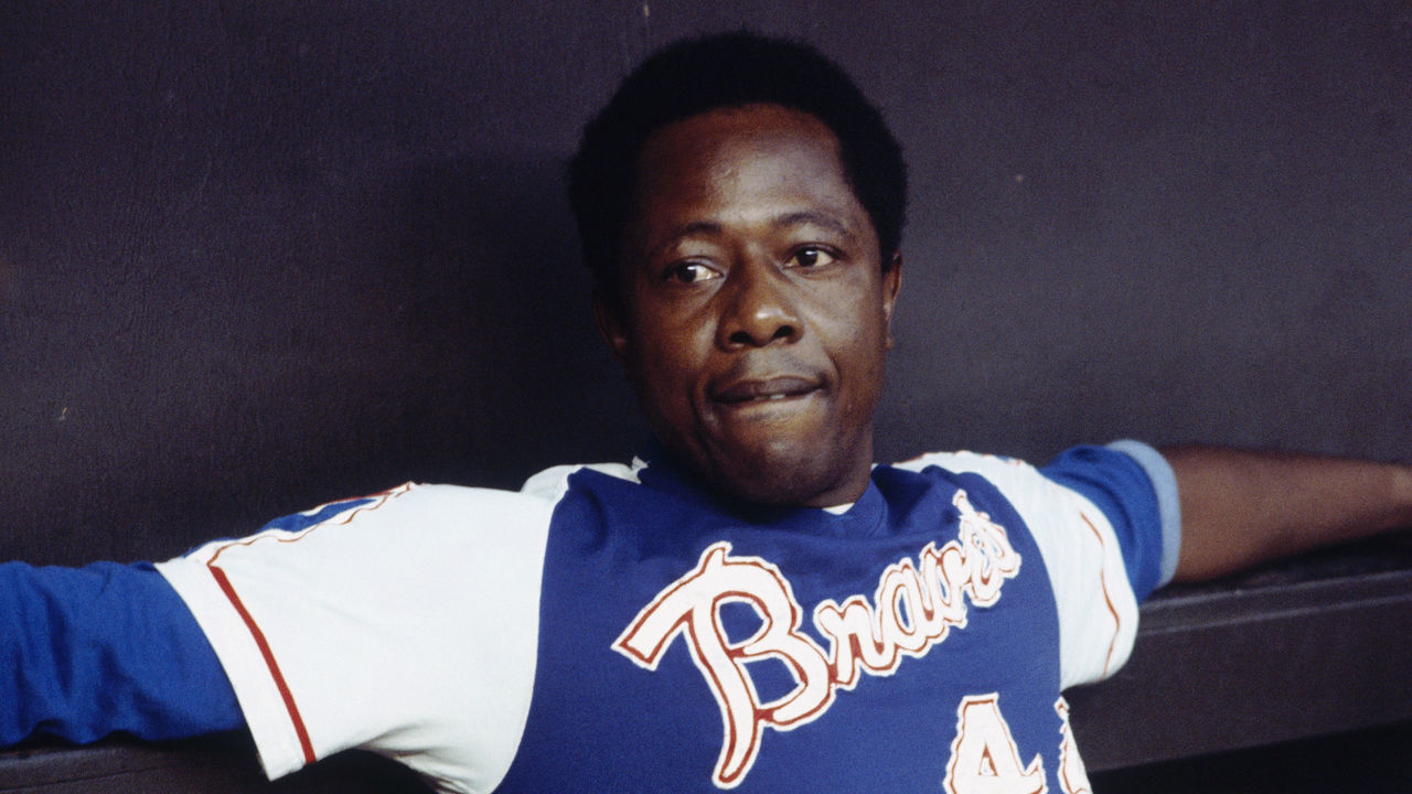 UNDATED: Outfielder Hank Aaron #44 of the Atlanta Braves relaxes in the dugout during a circa 1970s game.