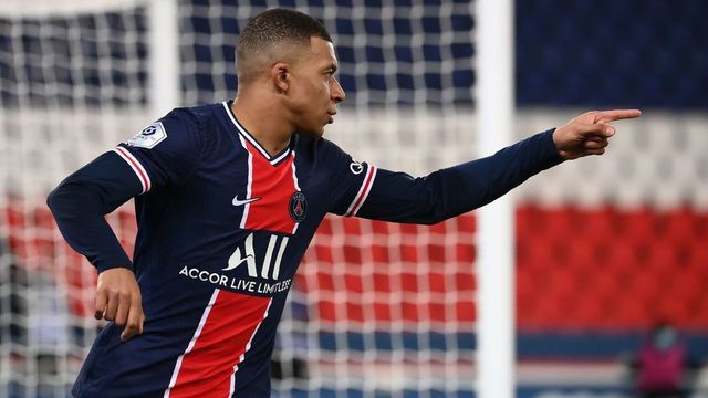 Paris Saint-Germain's French forward Kylian Mbappe celebrates after scoring a goal during the French L1 football match between Paris-Saint Germain (PSG) and Montpellier at The Parc des Princes Stadium in Paris on January 22, 2021.