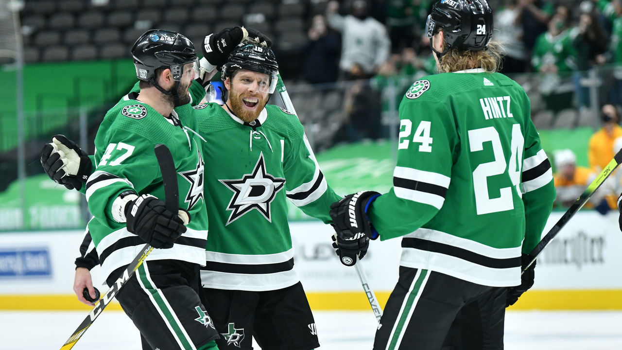 DALLAS, TX - JANUARY 22: Joe Pavelski #16 and the Dallas Stars celebrate a goal against the Nashville Predators at the American Airlines Center on January 22, 2021 in Dallas, Texas.