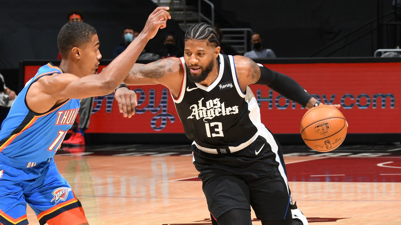 LOS ANGELES, CA - JANUARY 22: Paul George #13 of the LA Clippers handles the ball during the game against the Oklahoma City Thunder on January 22, 2021 at STAPLES Center in Los Angeles, California. NOTE TO USER: User expressly acknowledges and agrees that, by downloading and/or using this Photograph, user is consenting to the terms and conditions of the Getty Images License Agreement. Mandatory Copyright Notice: Copyright 2021 NBAE