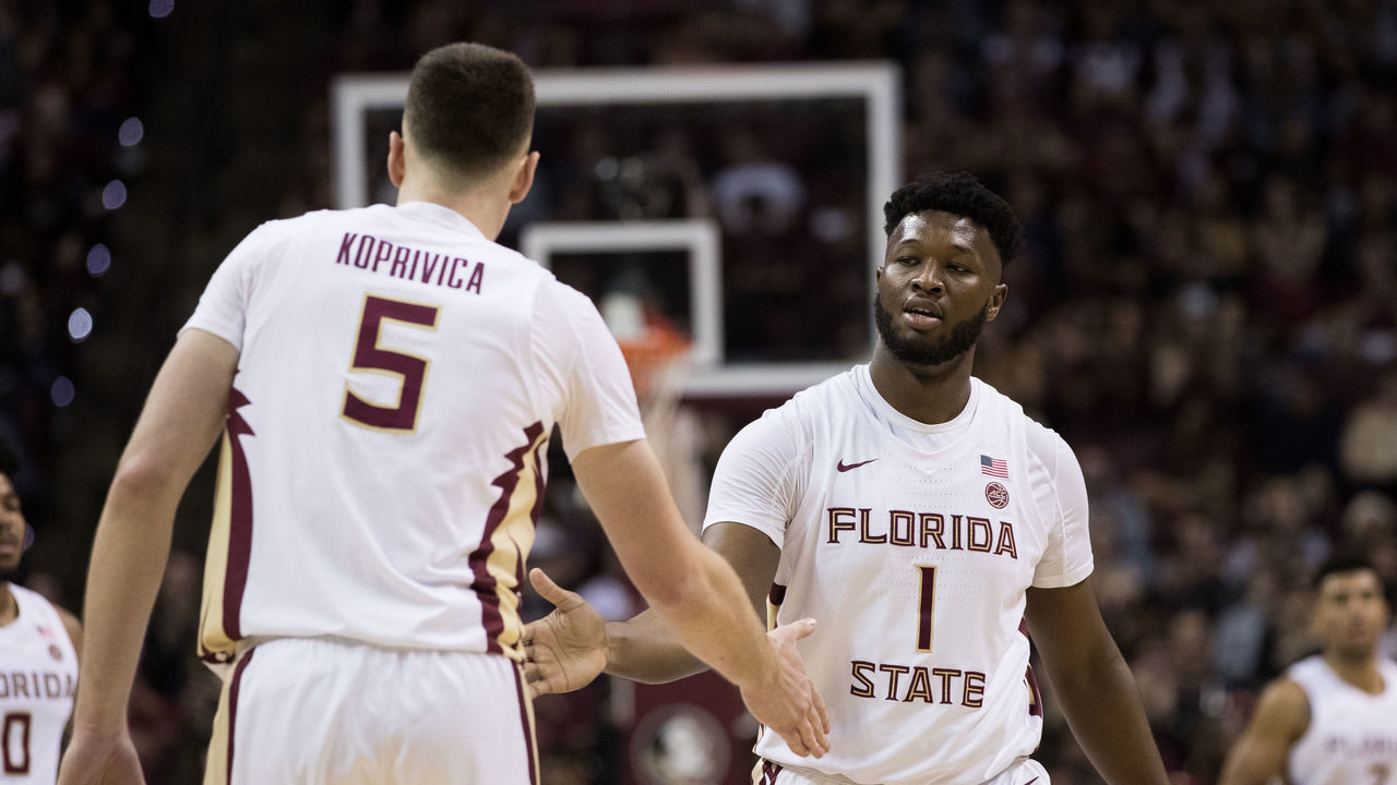 TALLAHASSEE, FL - MARCH 07: Florida State forward Raiquan Gray (1) high fives Florida State center Balsa Koprivica (5) during the game between the Boston College Eagles and the Florida State Seminoles at the Donald L. Tucker Center in Tallahassee, FL on March 7th, 2020.