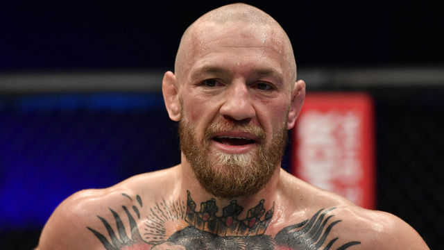 ABU DHABI, UNITED ARAB EMIRATES - JANUARY 23: Conor McGregor of Ireland reacts after his TKO loss to Dustin Poirier in a lightweight fight during the UFC 257 event inside Etihad Arena on UFC Fight Island on January 23, 2021 in Abu Dhabi, United Arab Emirates.