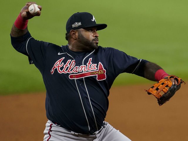ARLINGTON, TX - OCTOBER 12: Pablo Sandoval #18 of the Atlanta Braves throws to first base after fielding a ground ball during Game 1 of the NLCS between the Atlanta Braves and the Los Angeles Dodgers at Globe Life Field on Monday, October 12, 2020 in Arlington, Texas.