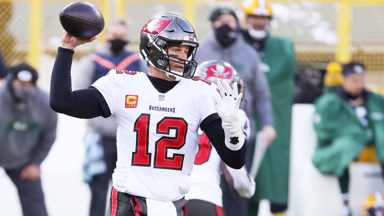 GREEN BAY, WISCONSIN - JANUARY 24: Tom Brady #12 of the Tampa Bay Buccaneers looks to pass in the first quarter against the Green Bay Packers during the NFC Championship game at Lambeau Field on January 24, 2021 in Green Bay, Wisconsin.