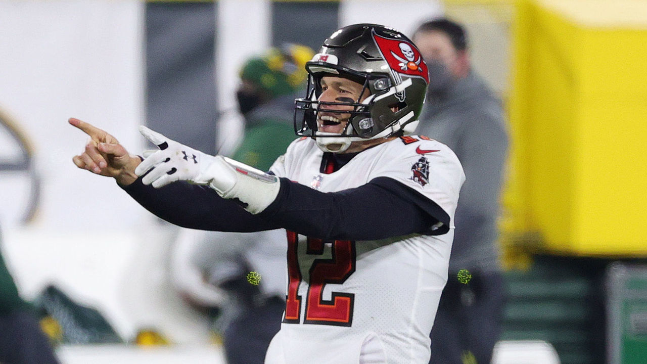 GREEN BAY, WISCONSIN - JANUARY 24: Tom Brady #12 of the Tampa Bay Buccaneers celebrates in the final seconds of their 31 to 26 win over the Green Bay Packers during the NFC Championship game at Lambeau Field on January 24, 2021 in Green Bay, Wisconsin.