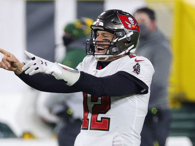 GREEN BAY, WISCONSIN - JANUARY 24: Tom Brady #12 of the Tampa Bay Buccaneers celebrates in the final seconds of their 31 to 26 win over the Green Bay Packers during the NFC Championship game at Lambeau Field on January 24, 2021 in Green Bay, Wisconsin.