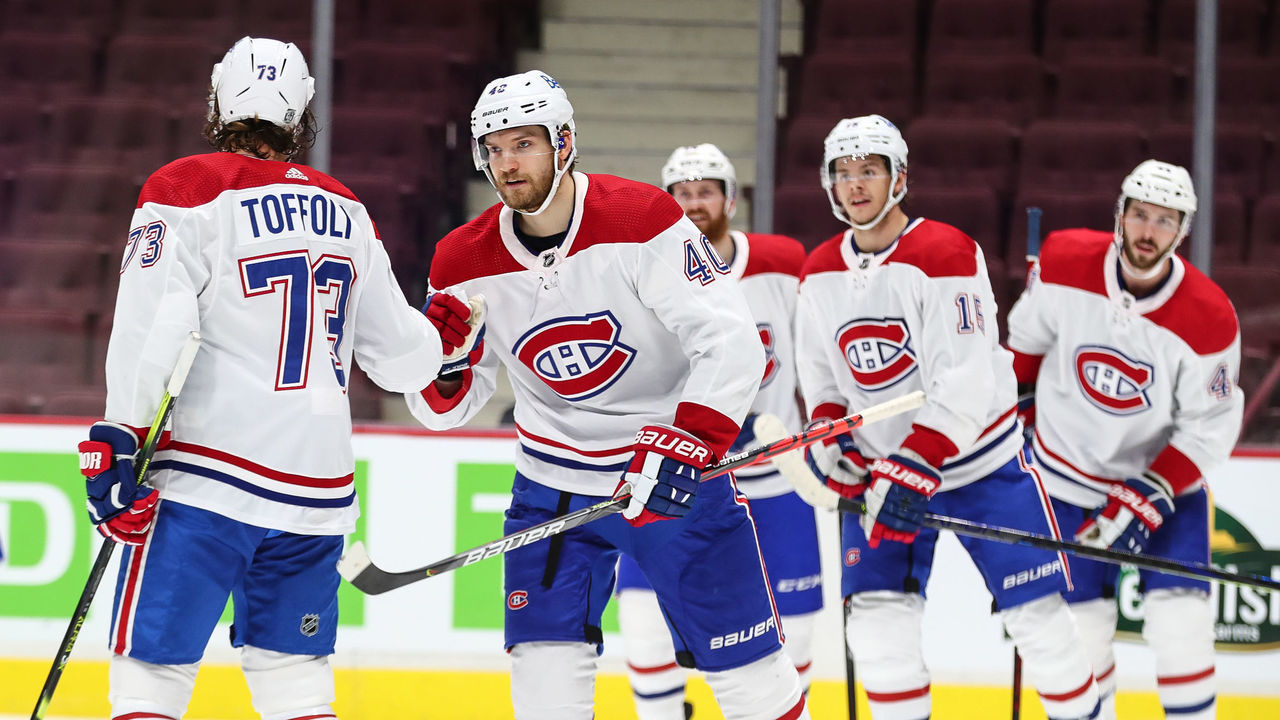 VANCOUVER, BC - JANUARY 21: Montreal Canadiens Right Wing Joel Armia (40) fist bumps Canadiens Left Wing Tyler Toffoli (73) after Armia scores a goal against the Vancouver Canucks during their NHL game at Rogers Arena on January 21, 2021 in Vancouver, British Columbia, Canada.