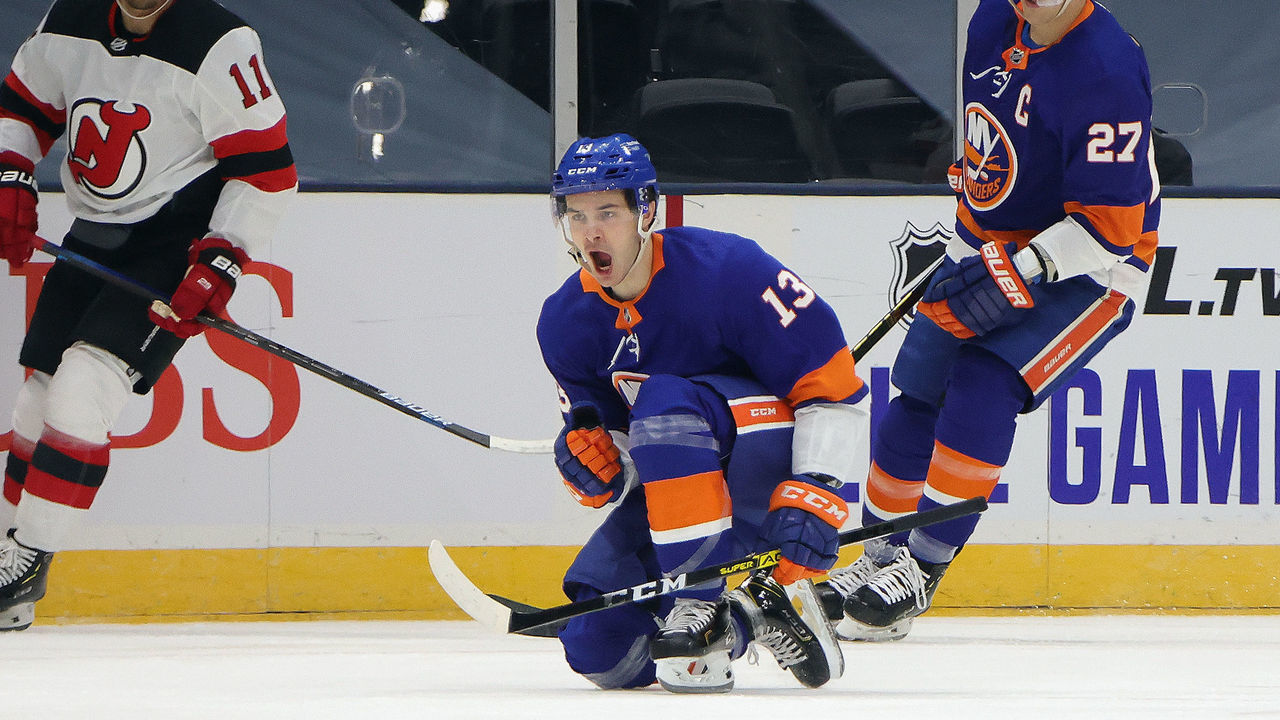 UNIONDALE, NEW YORK - JANUARY 21: Mathew Barzal #13 of the New York Islanders celebrates his goal at 4:43 of the first period against the New Jersey Devils at Nassau Coliseum on January 21, 2021 in Uniondale, New York.
