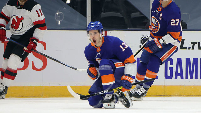 UNIONDALE, NEW YORK - JANUARY 21: Mathew Barzal #13 of the New York Islanders celebrates his goal at 4:43 of the first period against the New Jersey Devils at Nassau Coliseum on January 21, 2021 in Uniondale, New York.