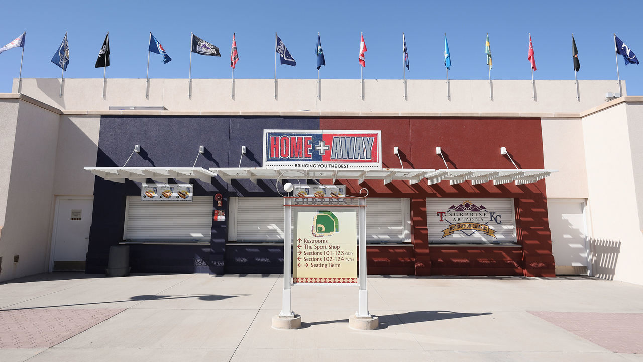 SURPRISE, ARIZONA - APRIL 07: 15 MLB Cactus League team flags are flown inside of the Texas Rangers and Kansas City Royals spring training facility, Surprise Stadium on April 07, 2020 in Surprise, Arizona. According to reports, Major League Baseball is considering a scenario in which all 30 of its teams play an abbreviated regular season without fans in Arizona's various baseball facilities, including Chase Field and 10 spring training venues.