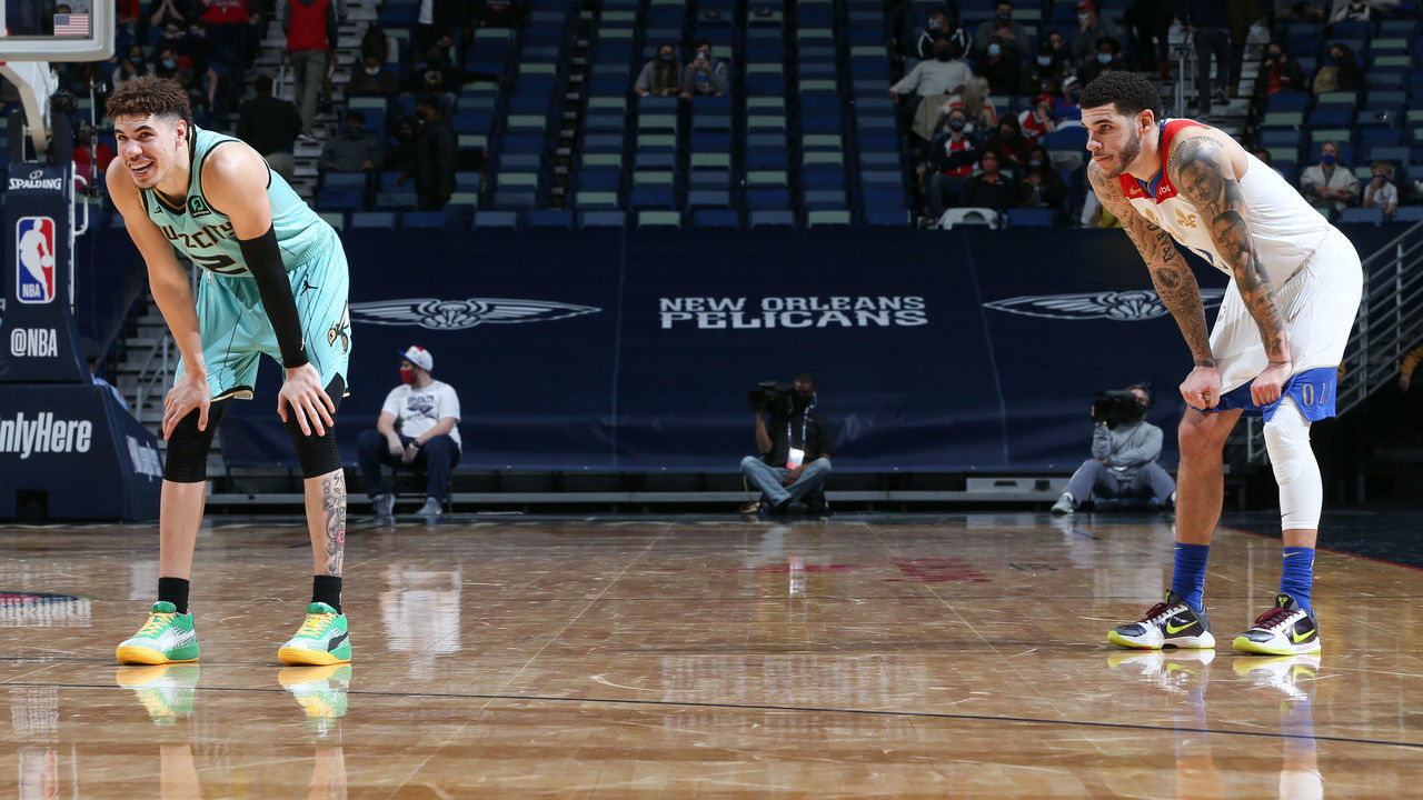 NEW ORLEANS, LA - JANUARY 8: LaMelo Ball #2 of the Charlotte Hornets and Lonzo Ball #2 of the New Orleans Pelicans look on during the game on January 8, 2021 at the Smoothie King Center in New Orleans, Louisiana. Mandatory Copyright Notice: Copyright 2021 NBAE