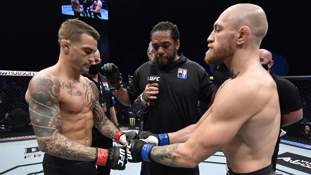 ABU DHABI, UNITED ARAB EMIRATES - JANUARY 23: (L-R) Opponents Dustin Poirier and Conor McGregor of Ireland face off prior to their lightweight fight during the UFC 257 event inside Etihad Arena on UFC Fight Island on January 23, 2021 in Abu Dhabi, United Arab Emirates.
