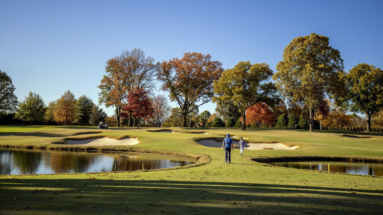 TULSA, OK - NOVEMBER 03: An pair of unidentified golfers approach the 13th and 16th greens at Southern Hills Country Club on November 3, 2020 in Tulsa, Oklahoma. Southern Hills Country Club is hosting the 2021 Kitchenaid Senior PGA Championship.